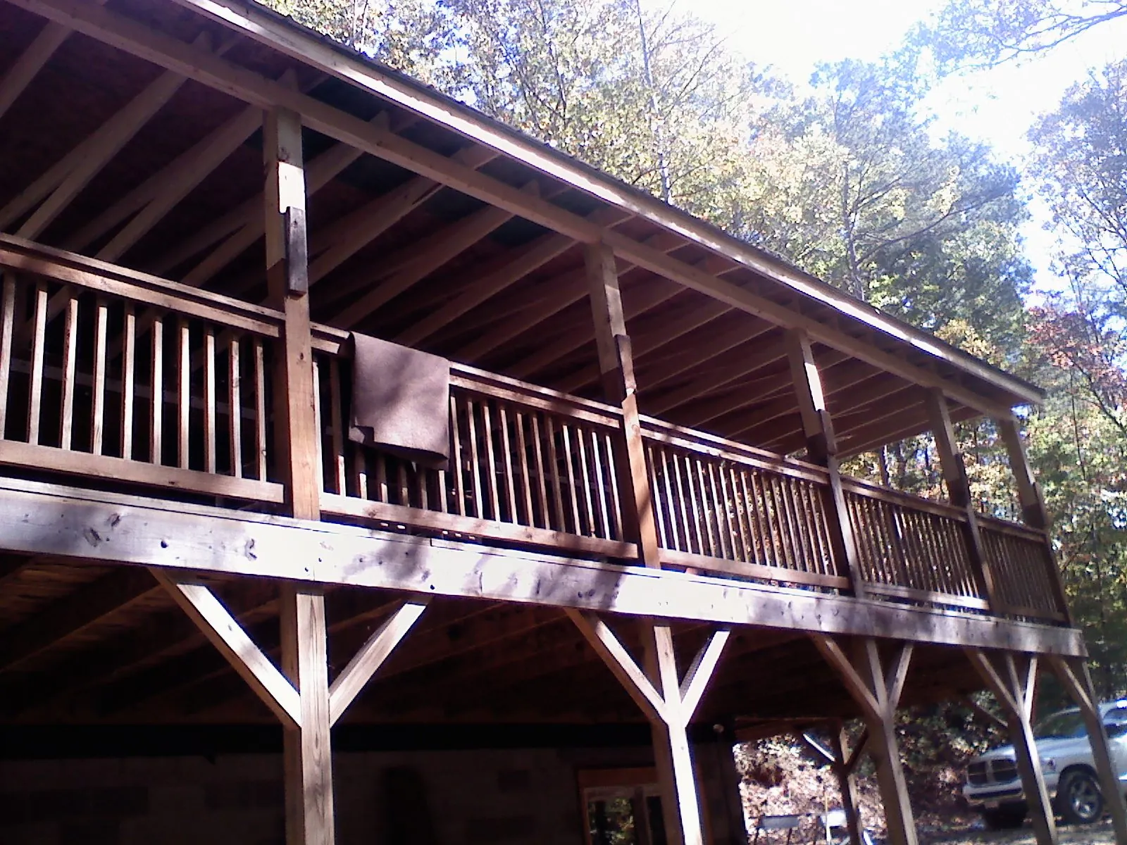 Timber framing under a new elevated porch and deck — Roof Leak Repair in Jonesville by Roofing Brothers